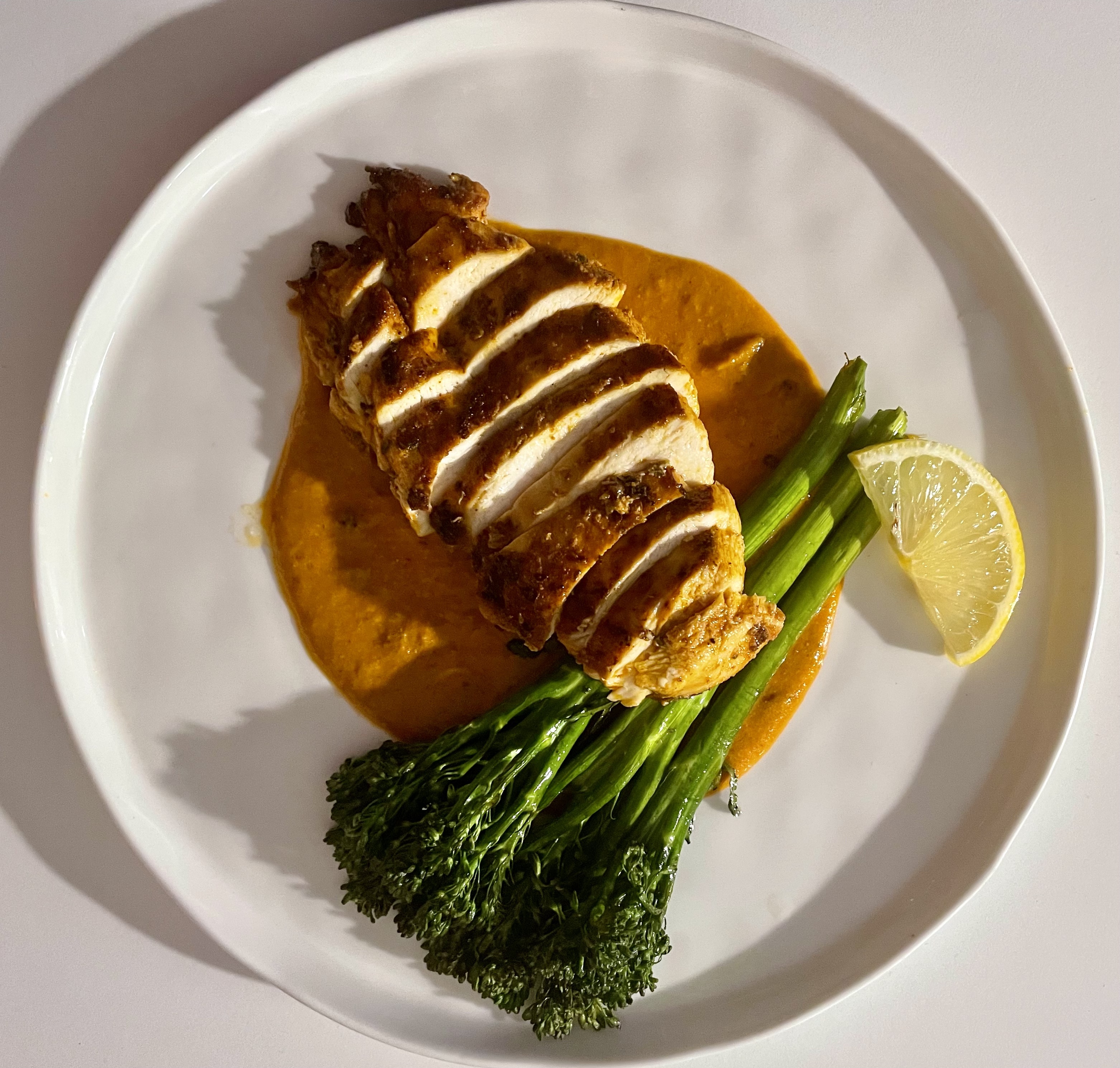 Paprika chicken with romesco and broccolini