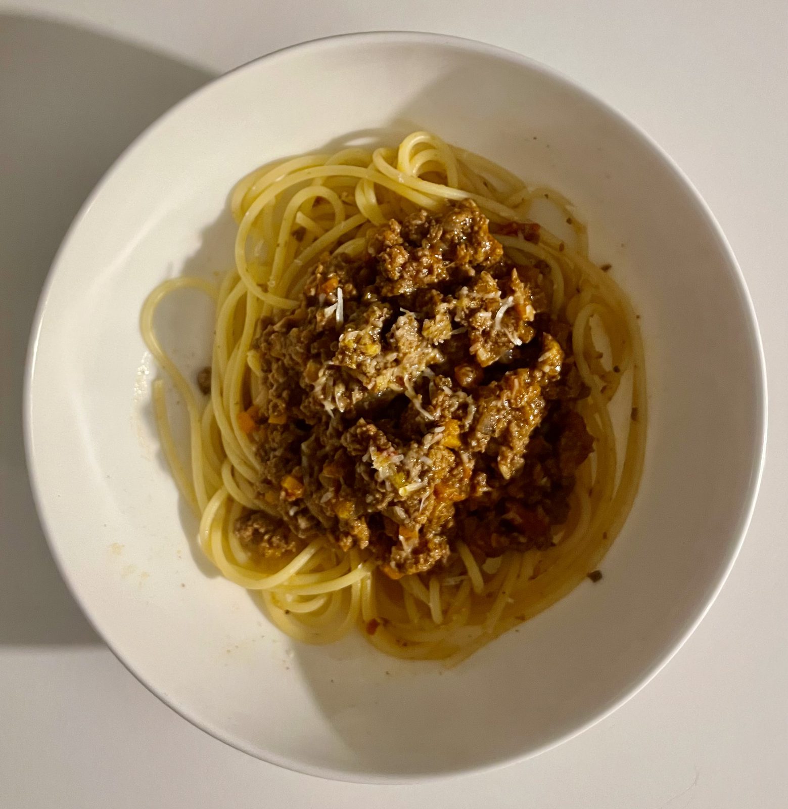 Beef bolognese with spaghetti and parmesan