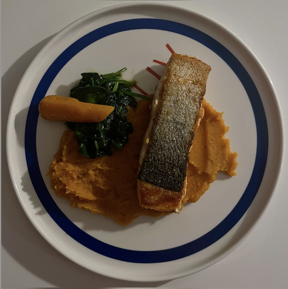 Crispy skin salmon with sweet potato mash, Dutch carrots and garlic spinach